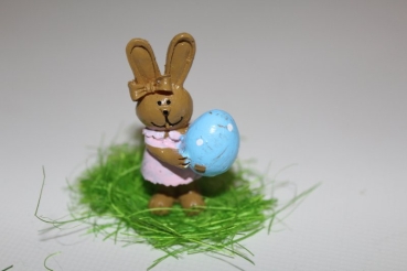 rabbit figure with blue egg