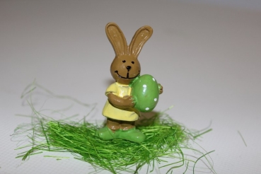 rabbit figure with green egg
